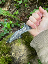 Refined double edged Corsair knife with abstract feather etching and African Blackwood handle