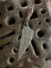 *AVAILABLE* Fancy Dancer Chef's knife with Fiddlehead fern etching and carved Morado handle.